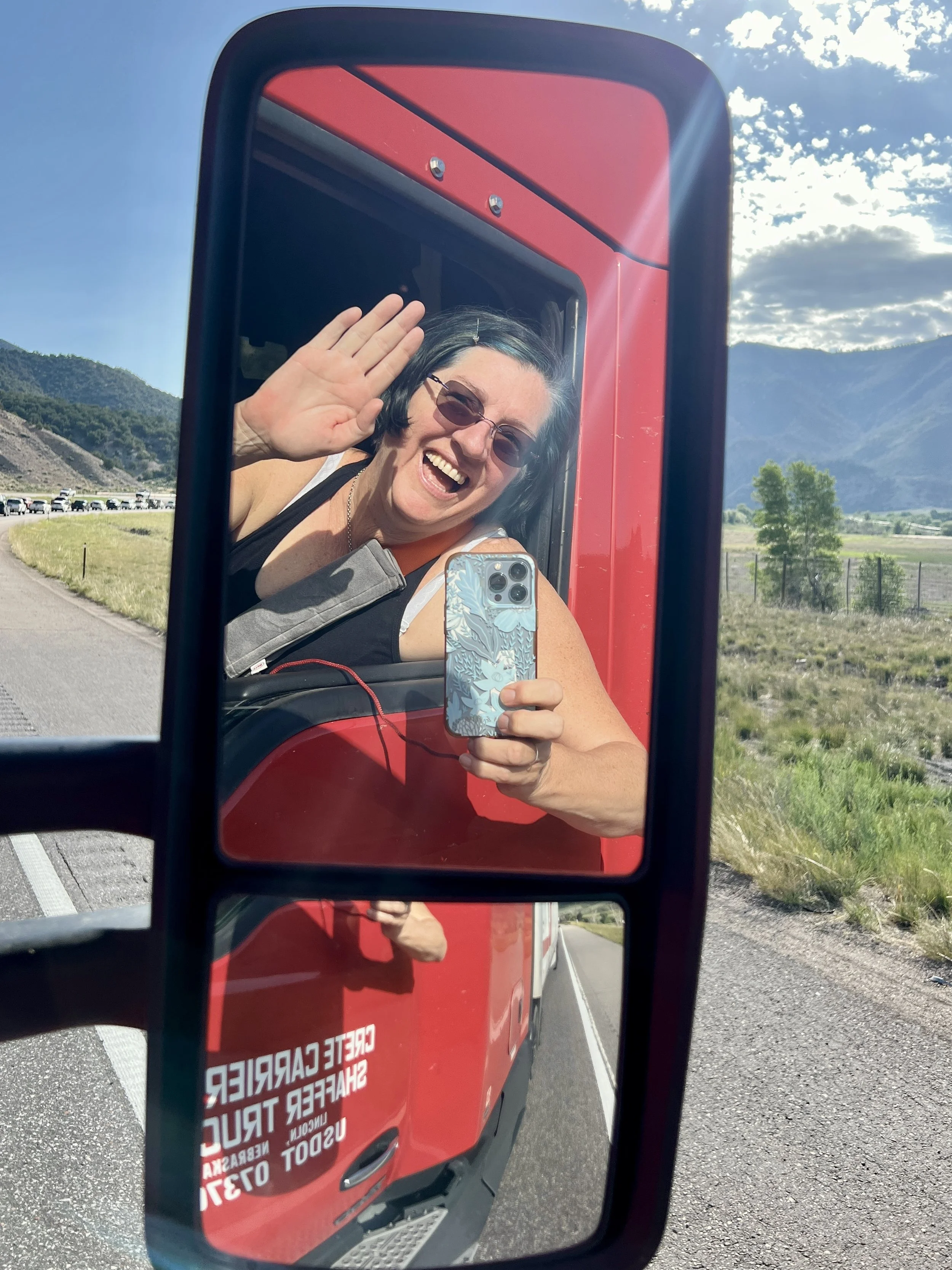 Tanja waving from the truck