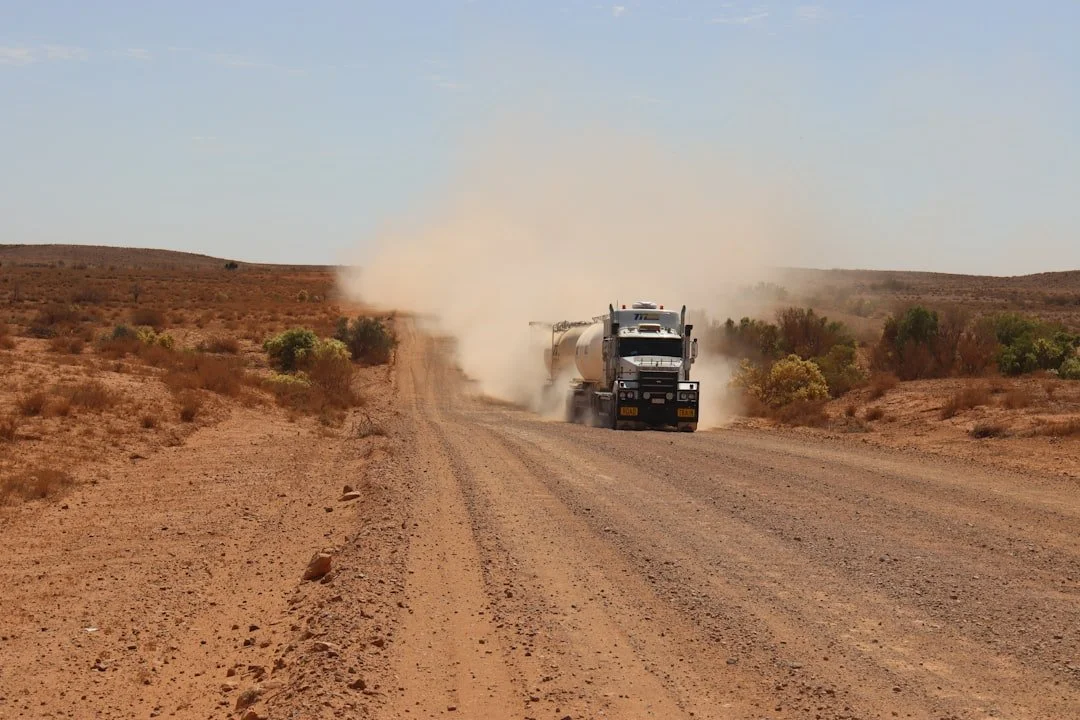 Road train truck driving through the outback