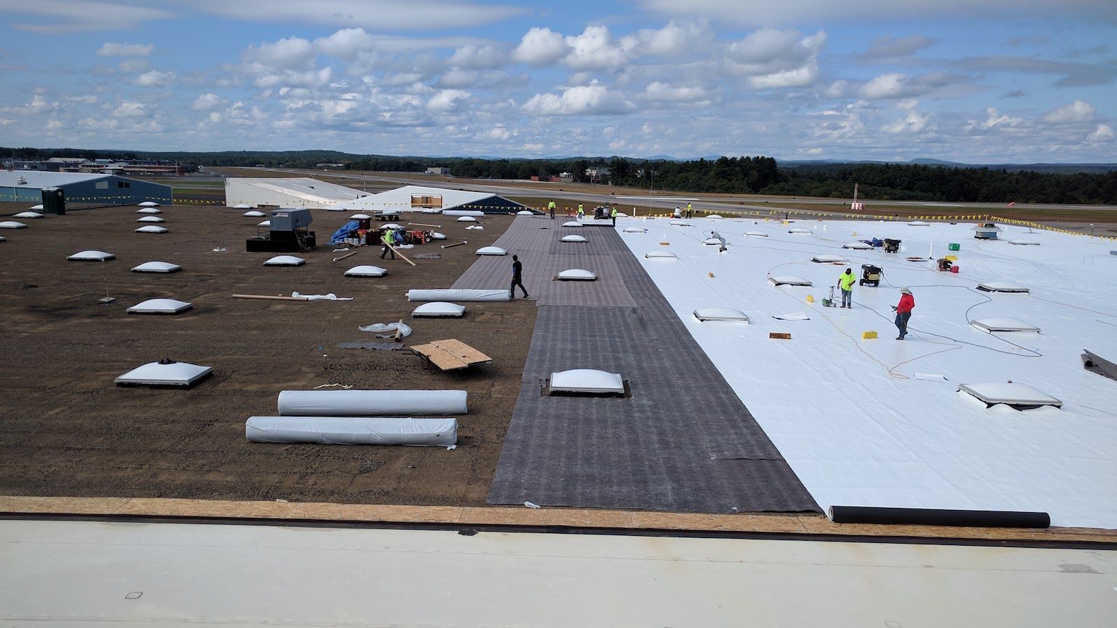 Large commercial roof installation in progress