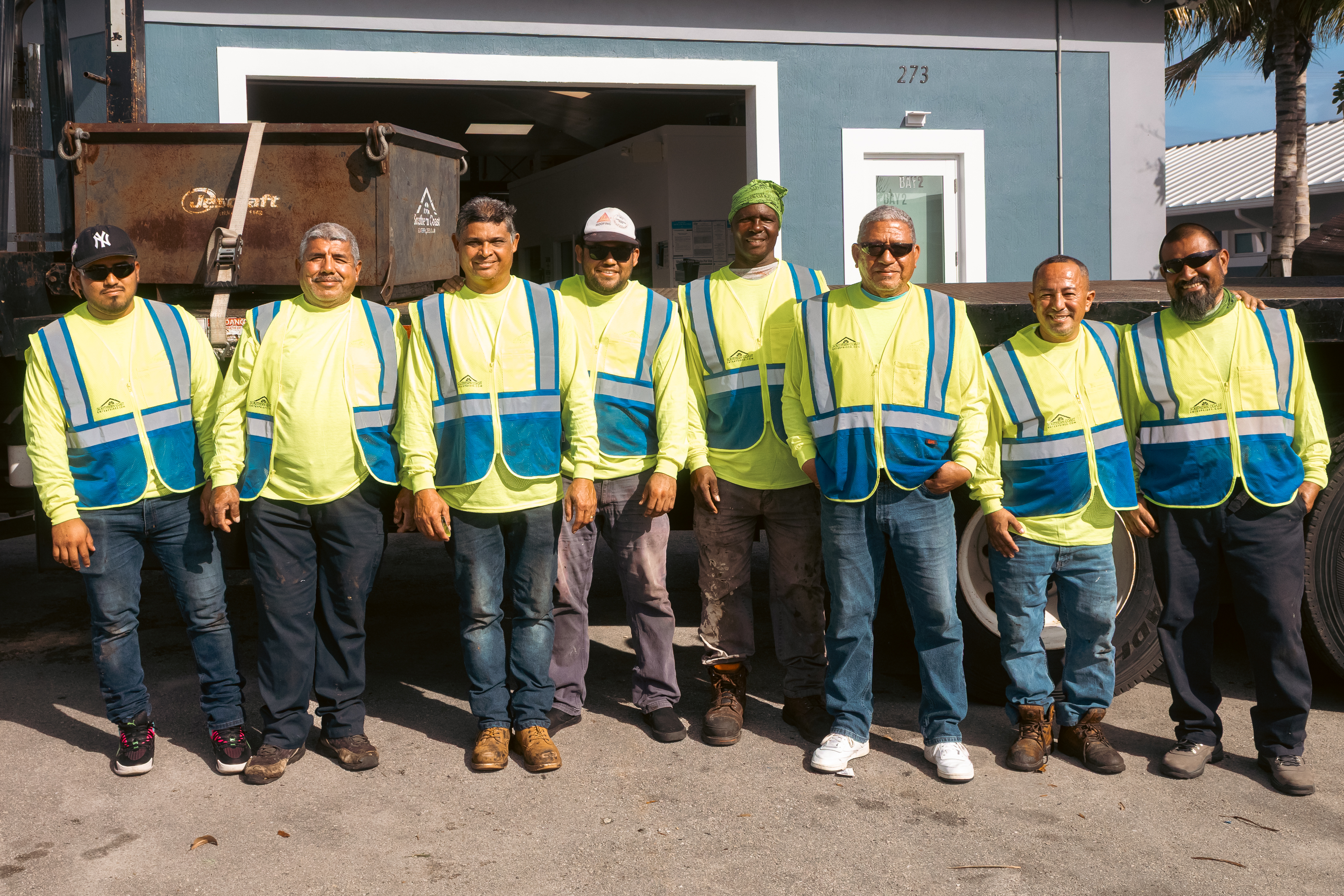 Seven Southern Coast field crew members standing together in company workwear