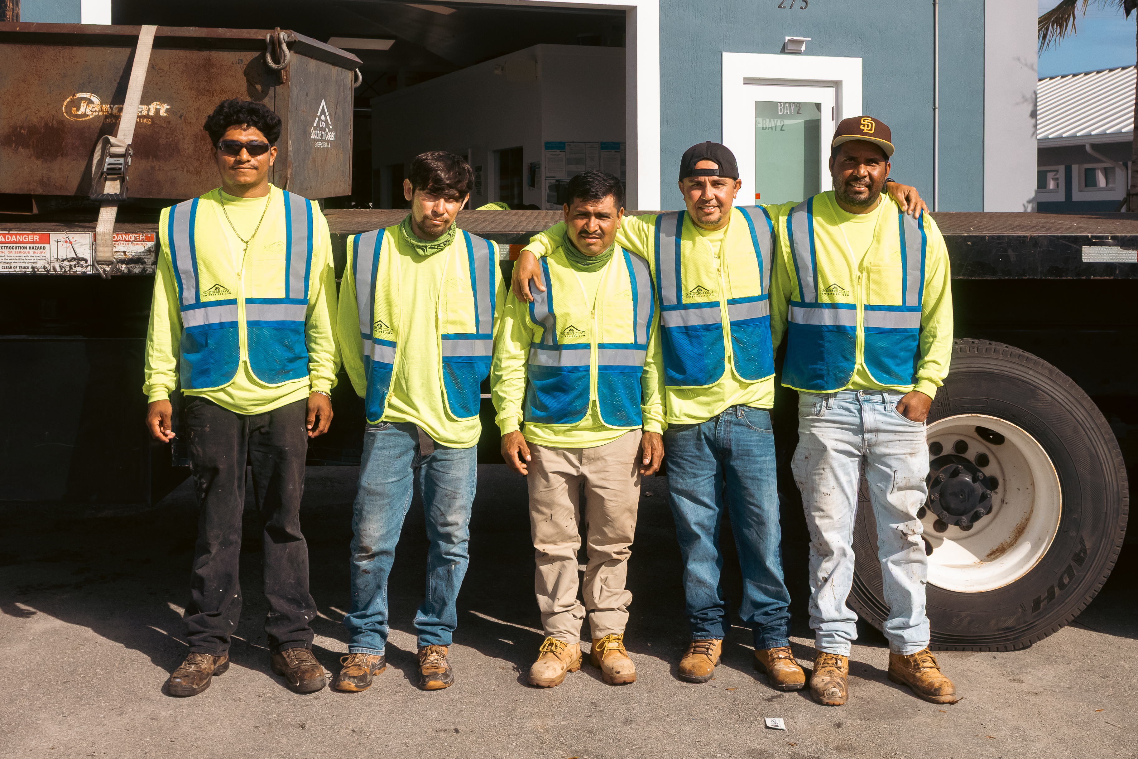 Five Southern Coast field crew members standing together in workwear
