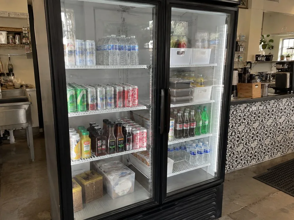 Glass-door commercial refrigerator cooling repair photo in Miami