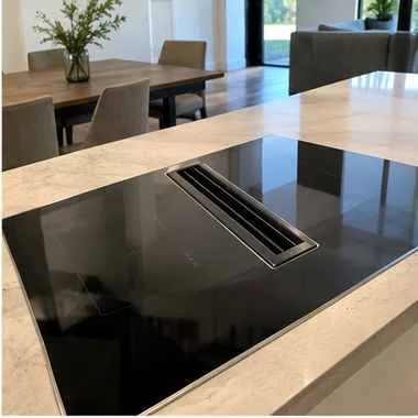 Downdraft cooktop photographed after service in a customer home
