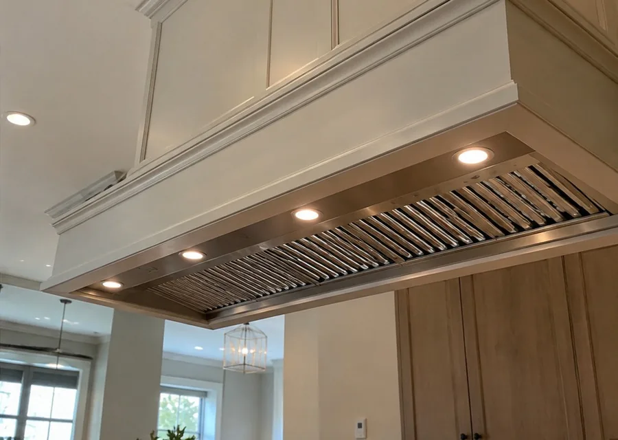 Custom Hood Insert photographed after high-end hood repair in a customer's home