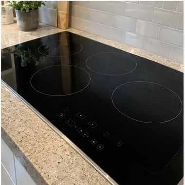 Radiant glass cooktop photographed after repair in a customer kitchen
