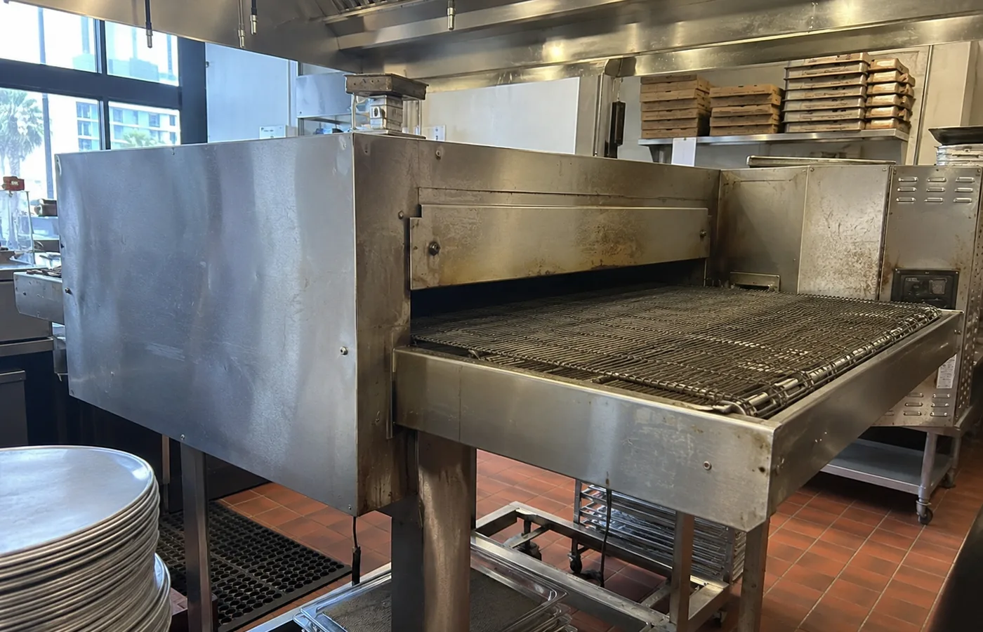 Commercial conveyor pizza oven ready after belt-drive service in Tampa