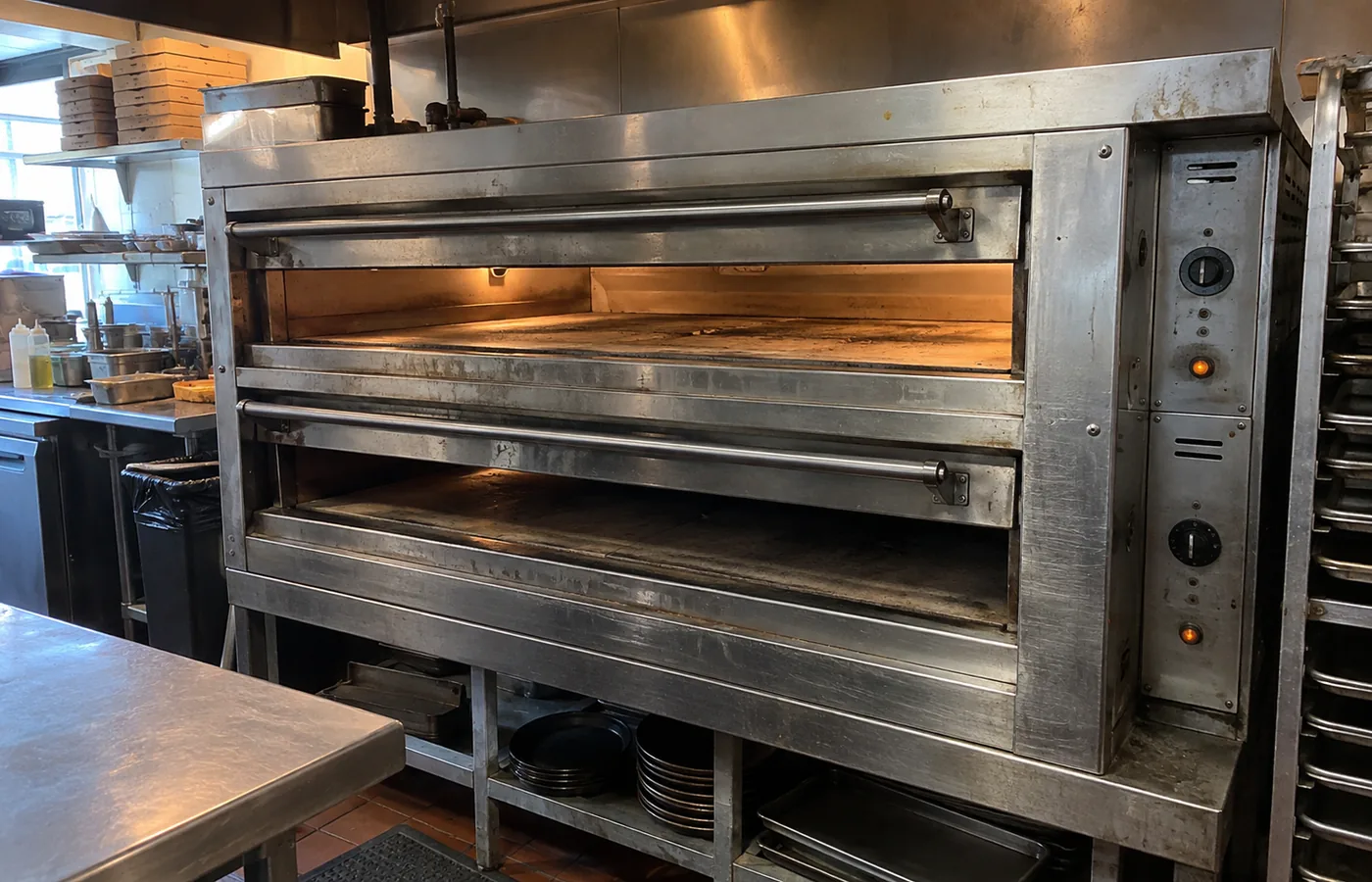 Stone-hearth deck oven ready after uneven-heat service