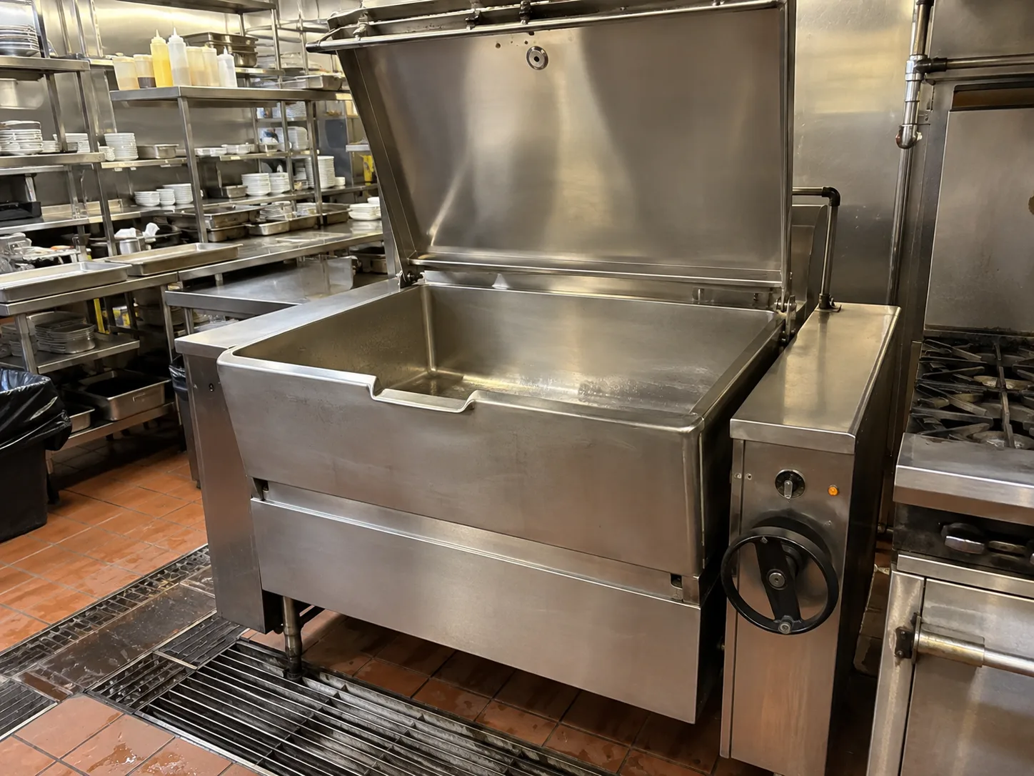 Commercial gas tilt skillet ready after heating service in Ybor City