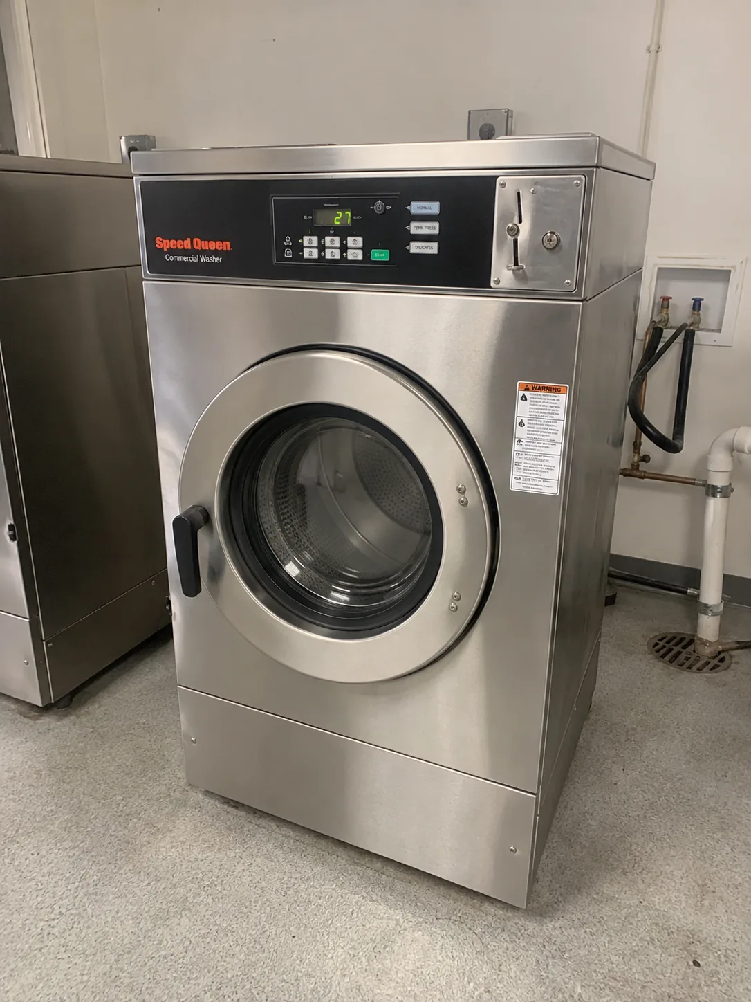 Commercial washer after drain repair