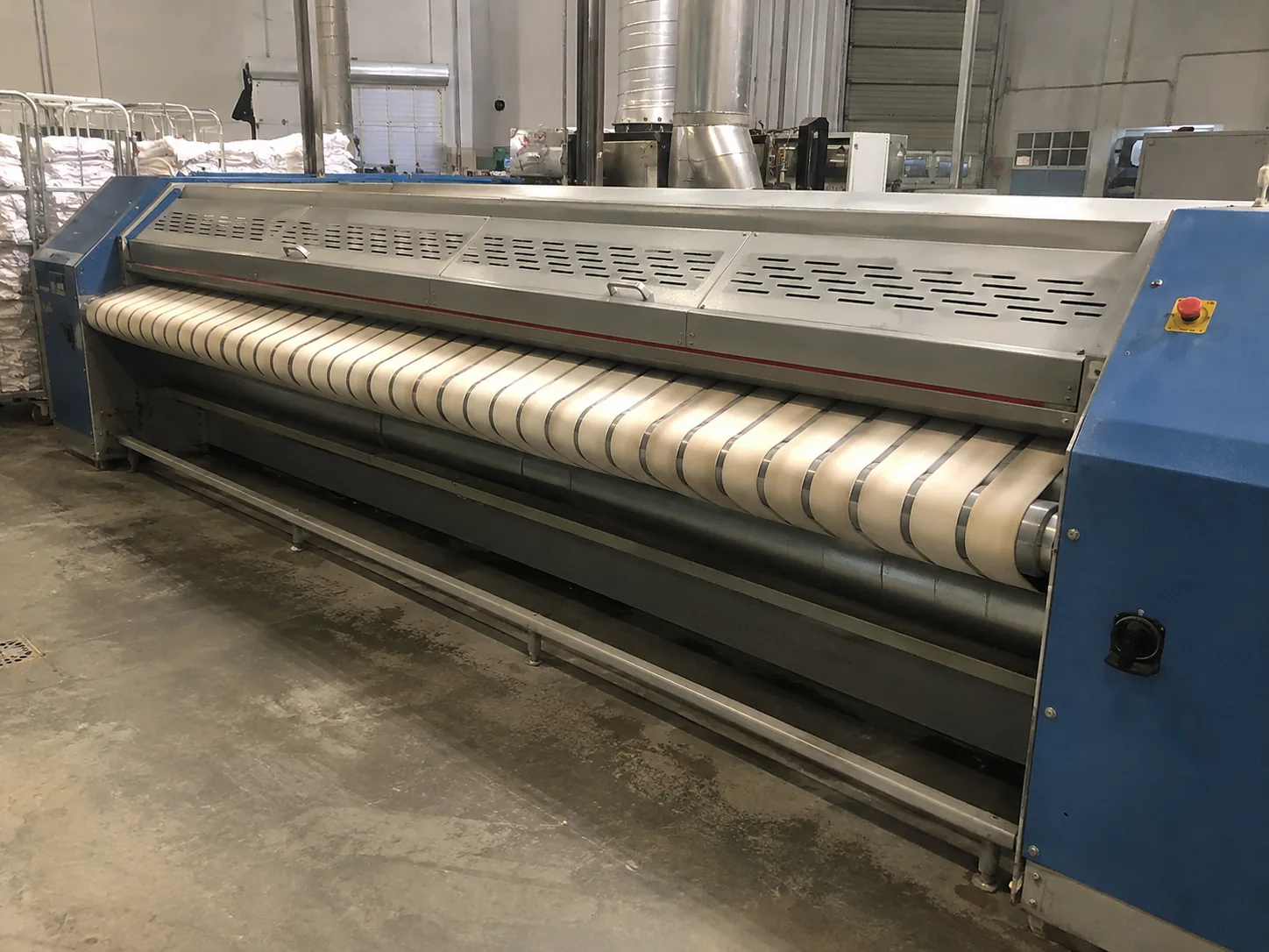 Flatwork ironer after feed repair