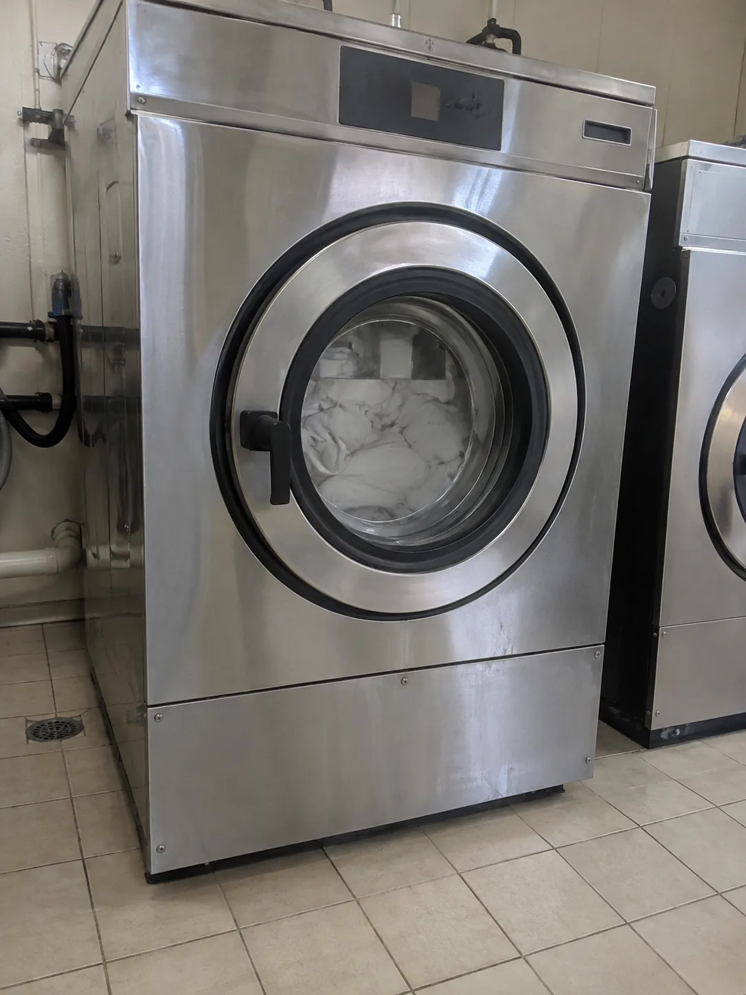 Commercial washer after drain repair