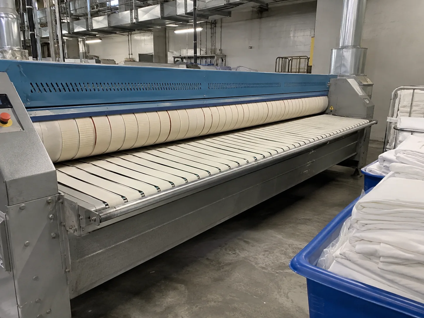Flatwork ironer after feed repair