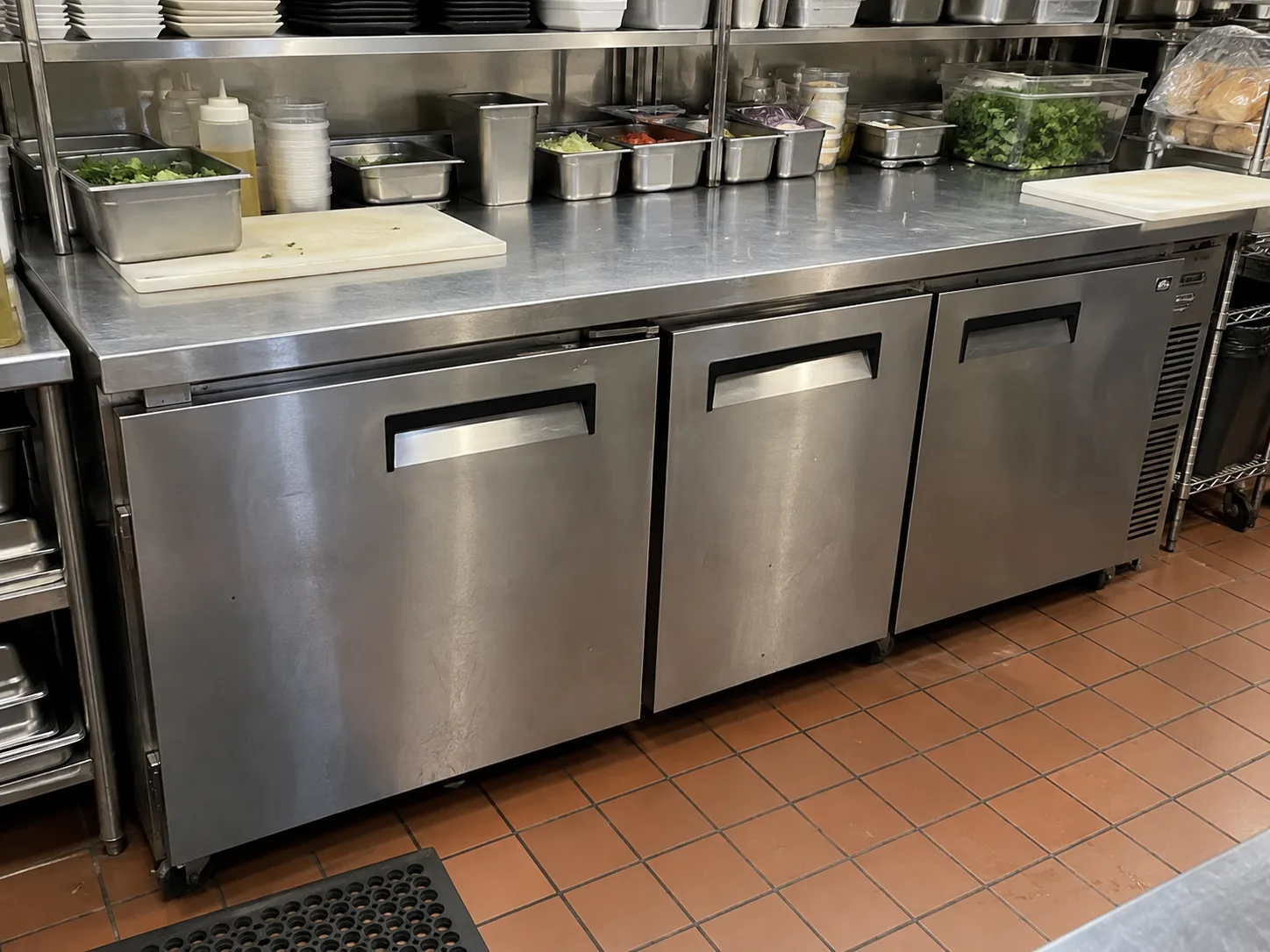 Three-door commercial worktop refrigerator after temperature repair in Decatur