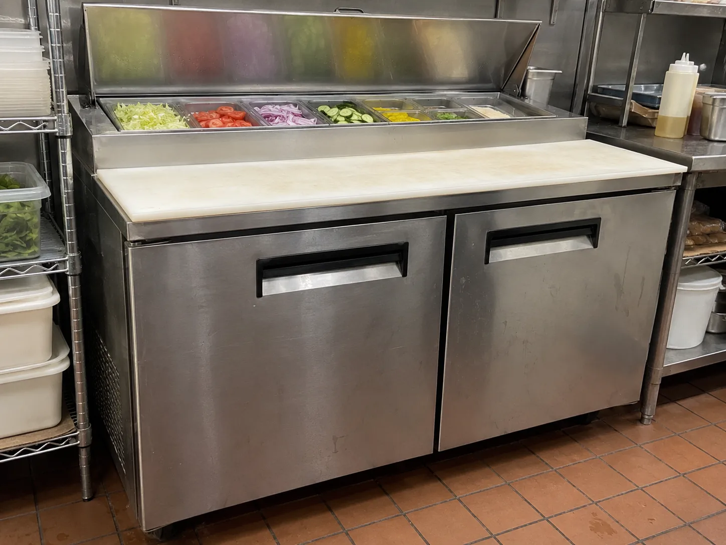 Two-door sandwich prep table after cooling service in Midtown Atlanta