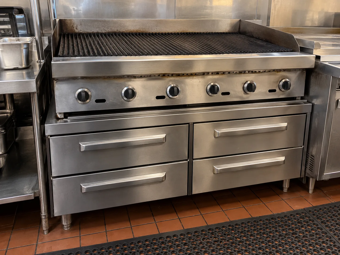 Four-drawer commercial chef base after gasket replacement