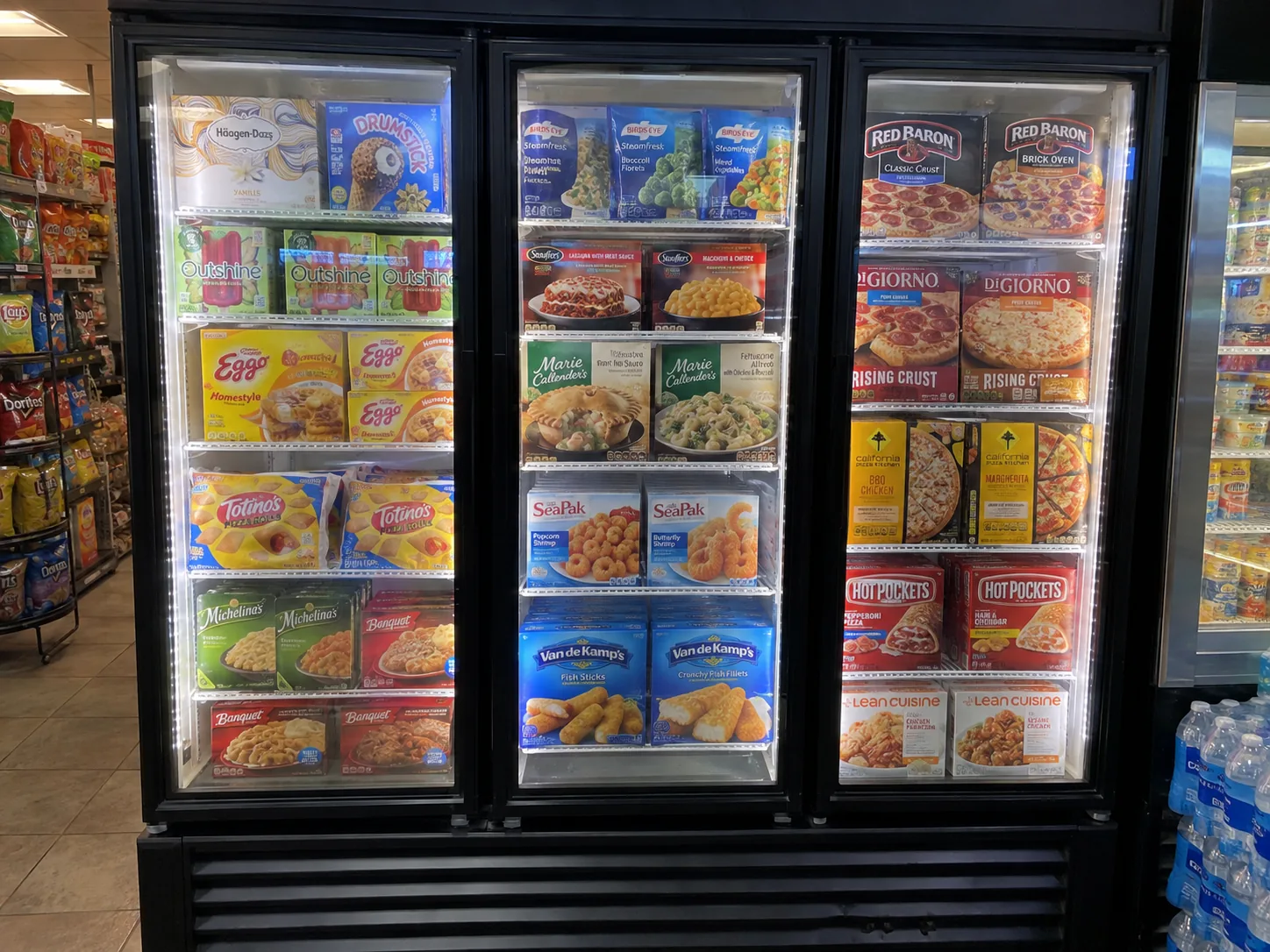 Glass-door freezer merchandiser after defrost repair in Clearwater