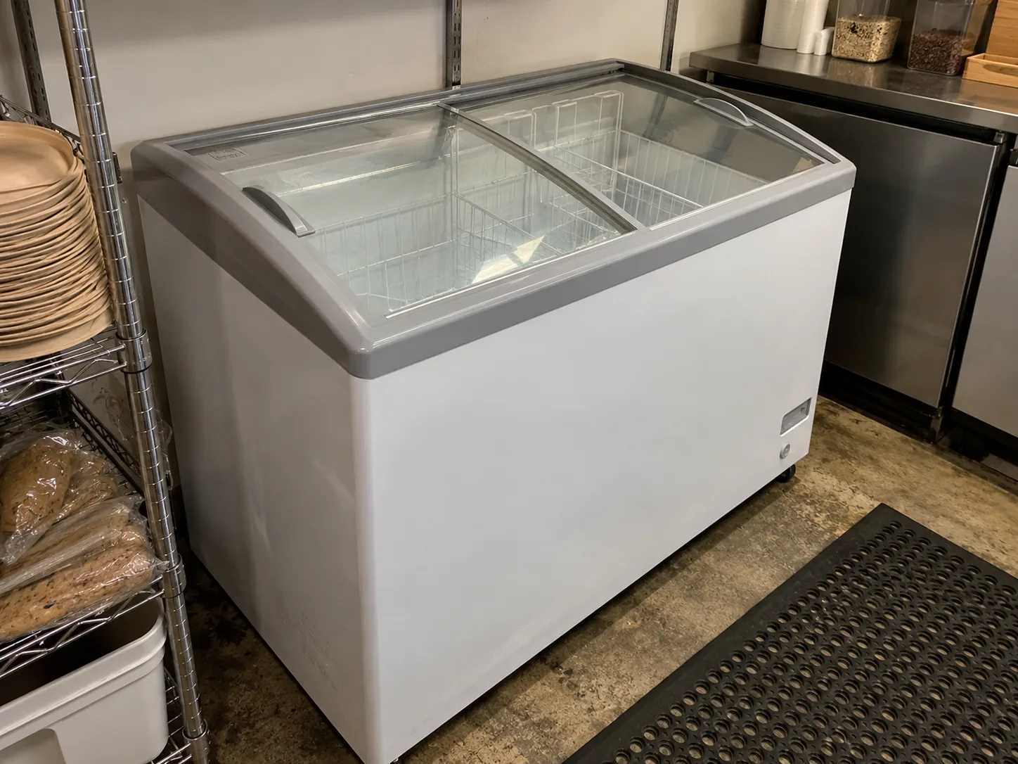 Glass-top commercial chest freezer after service in Tampa