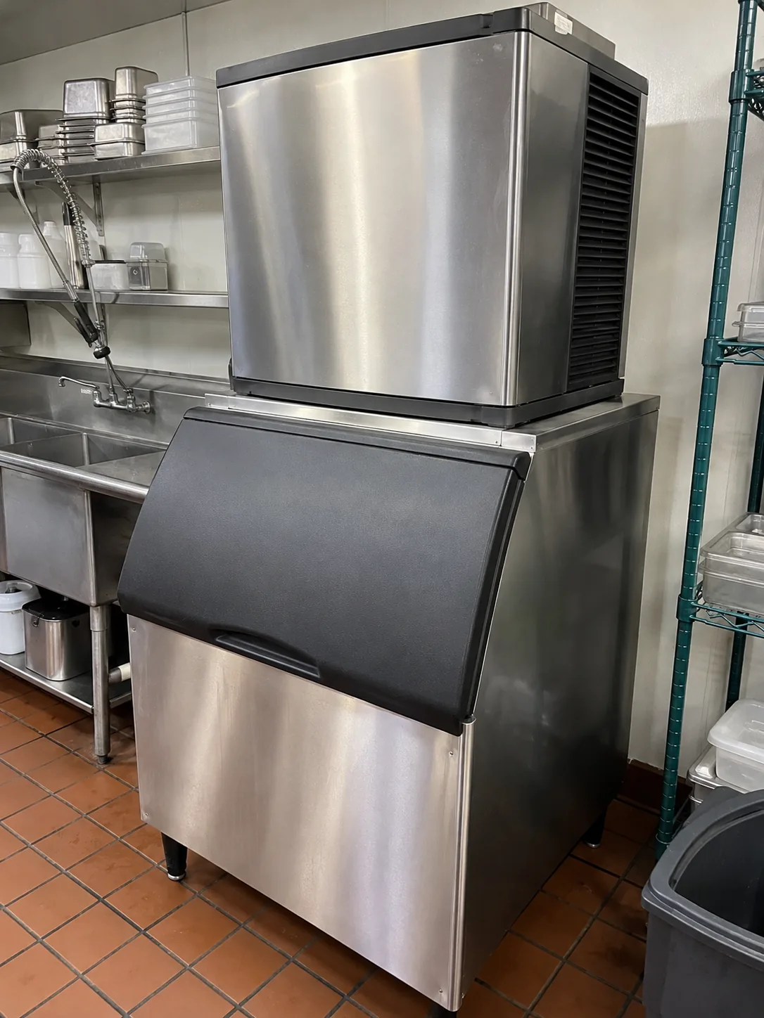 Commercial ice maker with storage bin after sensor service