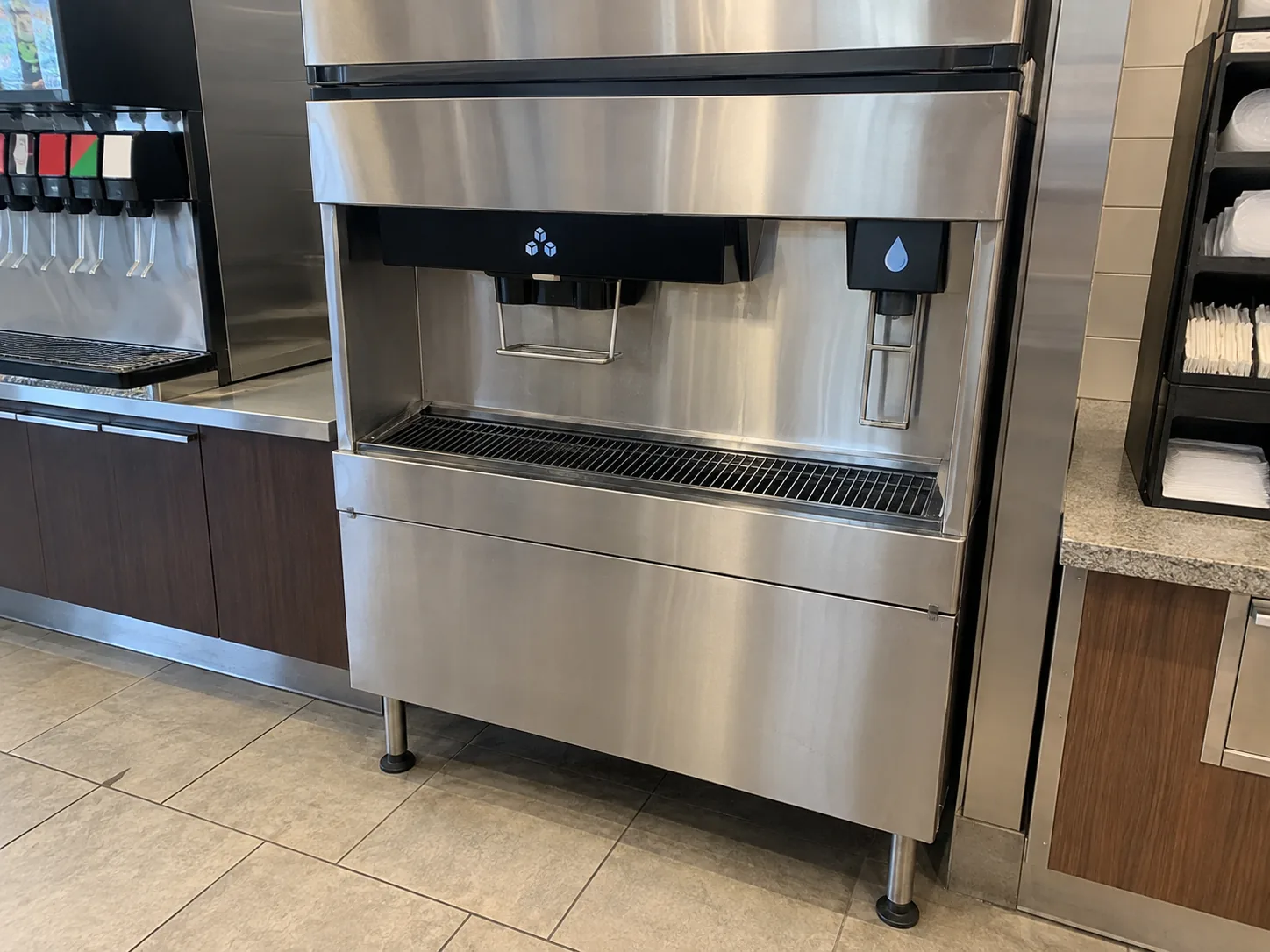 Commercial ice and water dispenser after leak repair