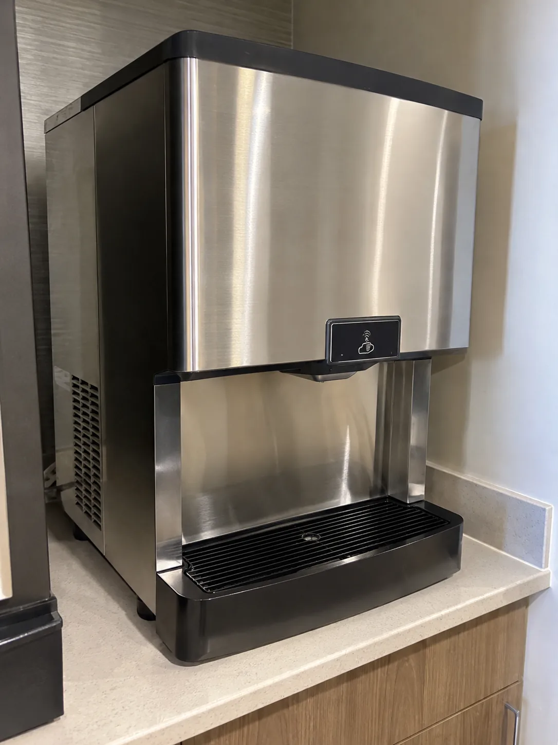 Touchless commercial ice dispenser after sensor service