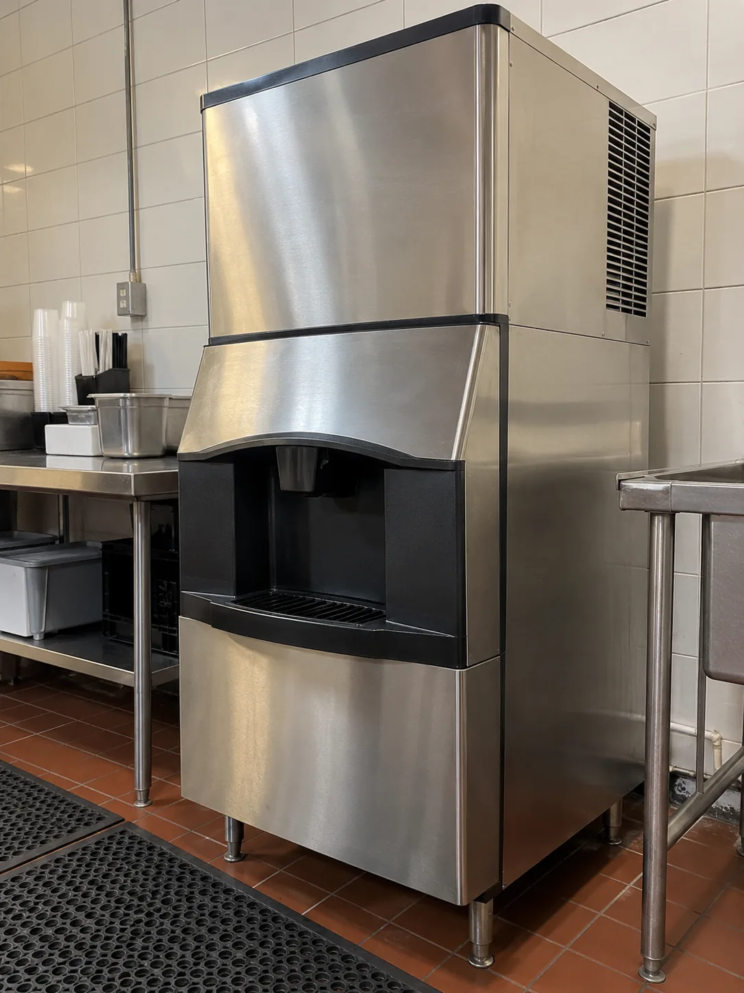 Freestanding commercial ice dispenser after service