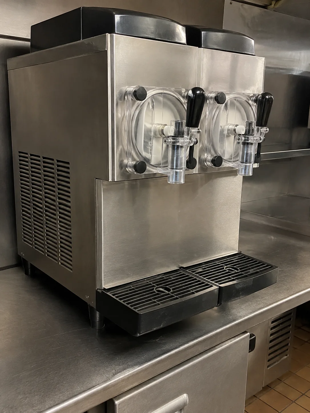 Commercial frozen beverage freezer after service