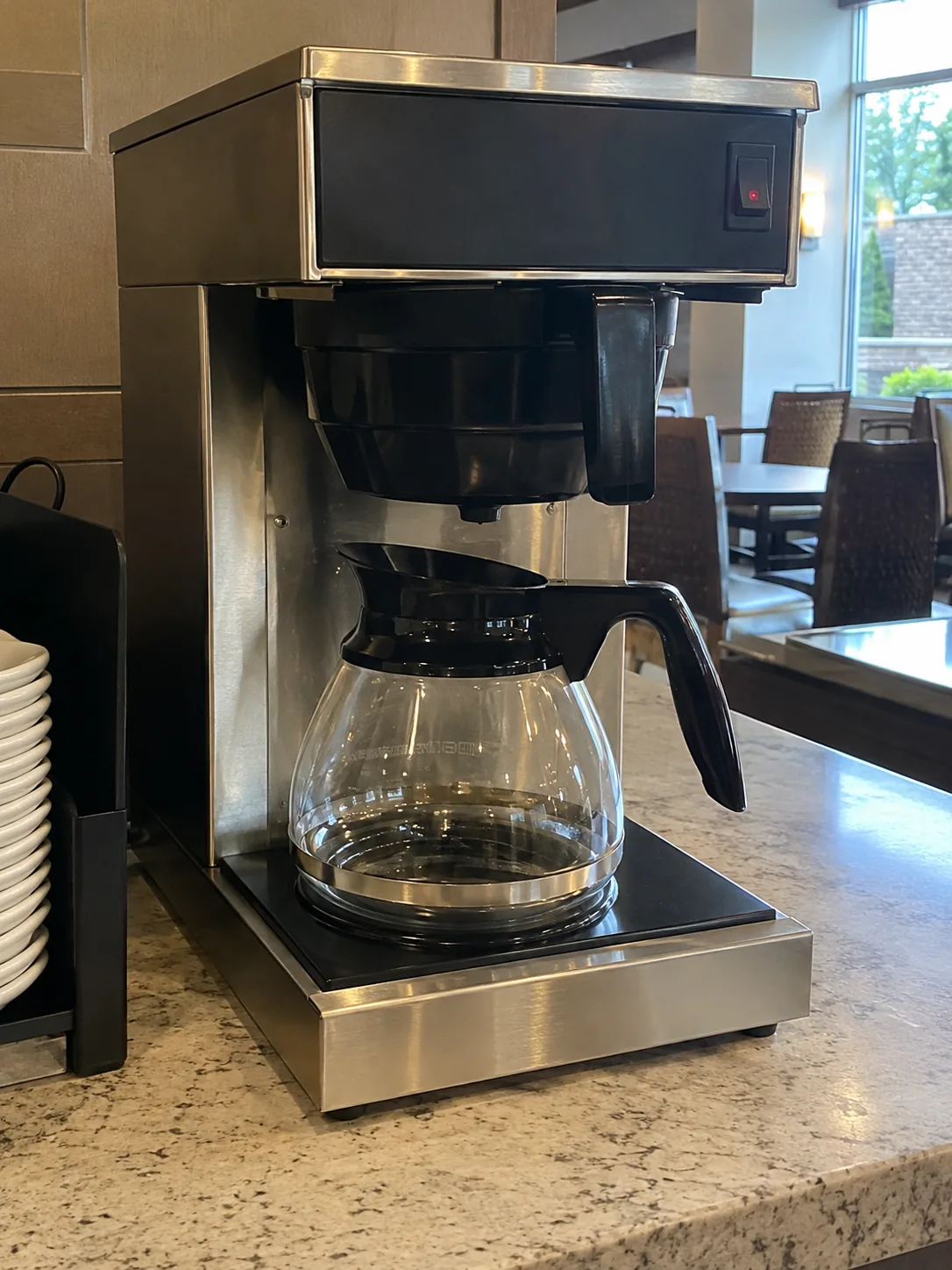 Commercial batch coffee brewer after water fill service