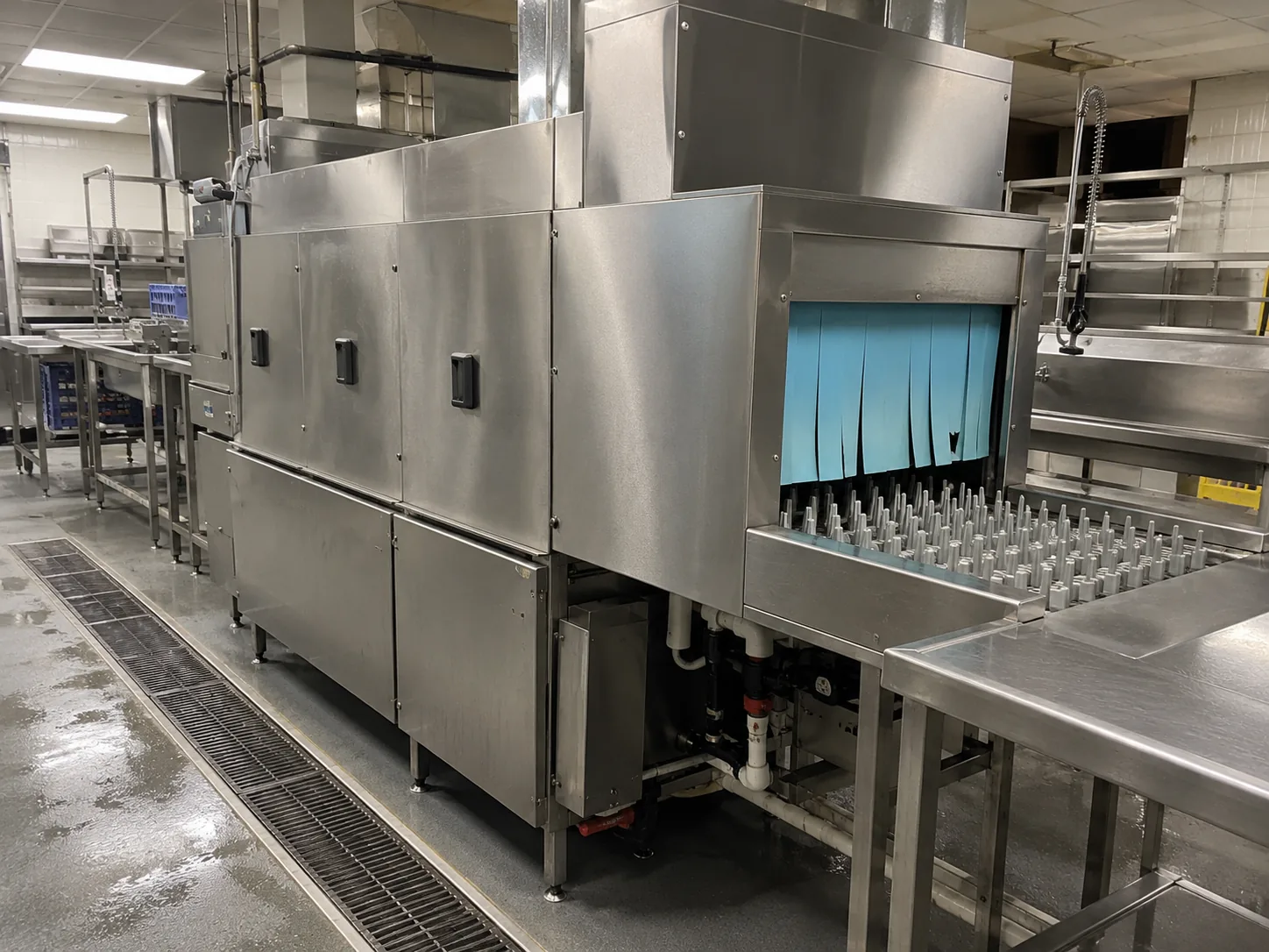 Commercial rack conveyor dishwasher after service