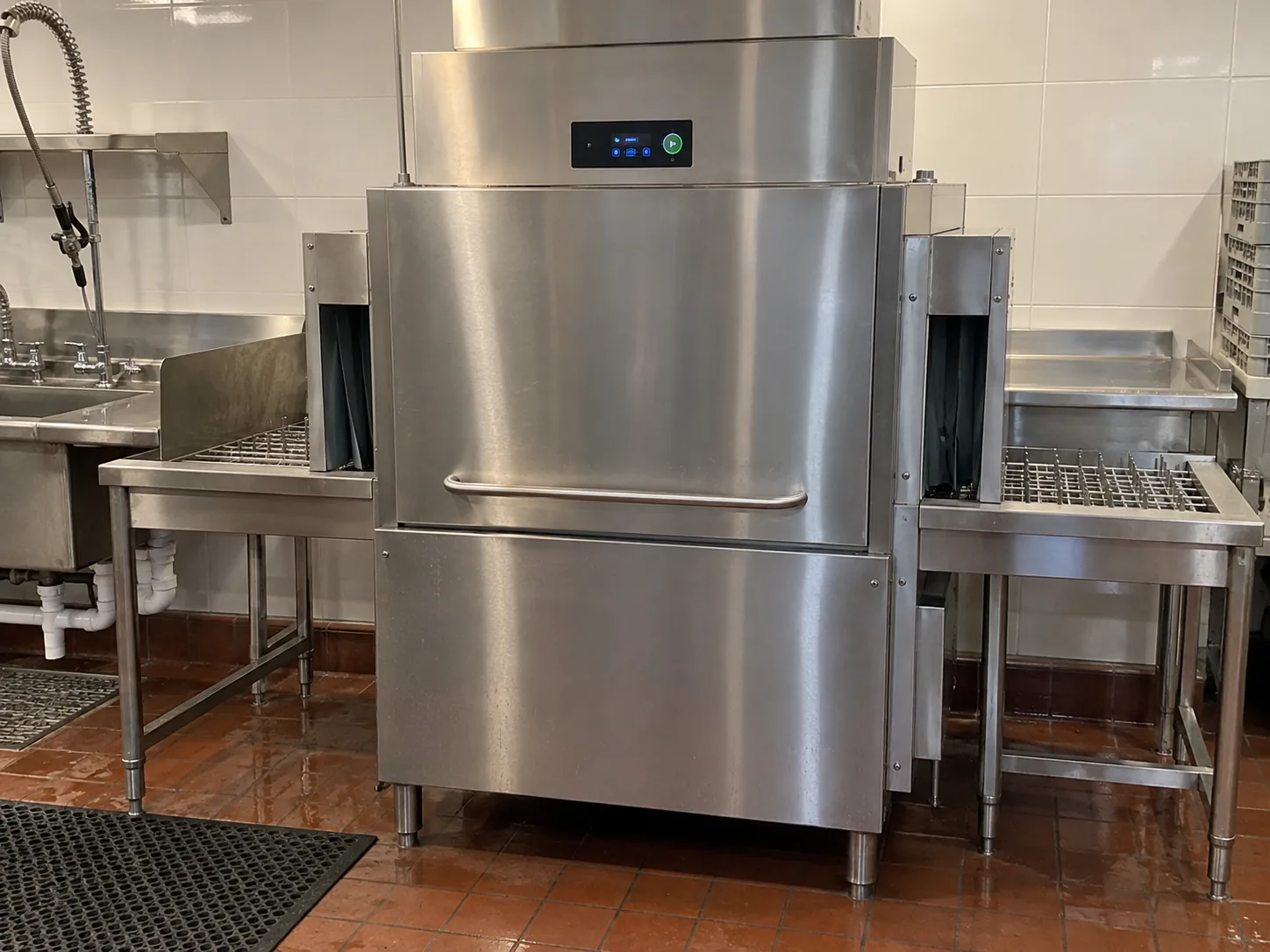 Commercial hood dishwasher after leak service