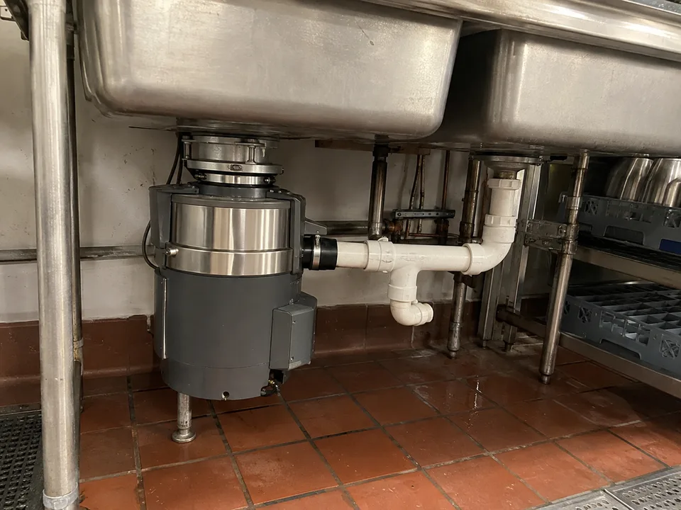 Commercial food waste disposer after motor service
