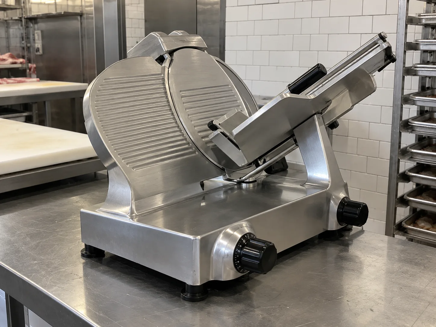 Gravity-feed meat slicer after service