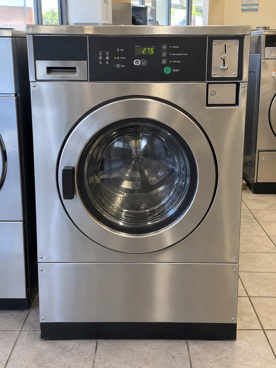 Coin-operated commercial washer after service