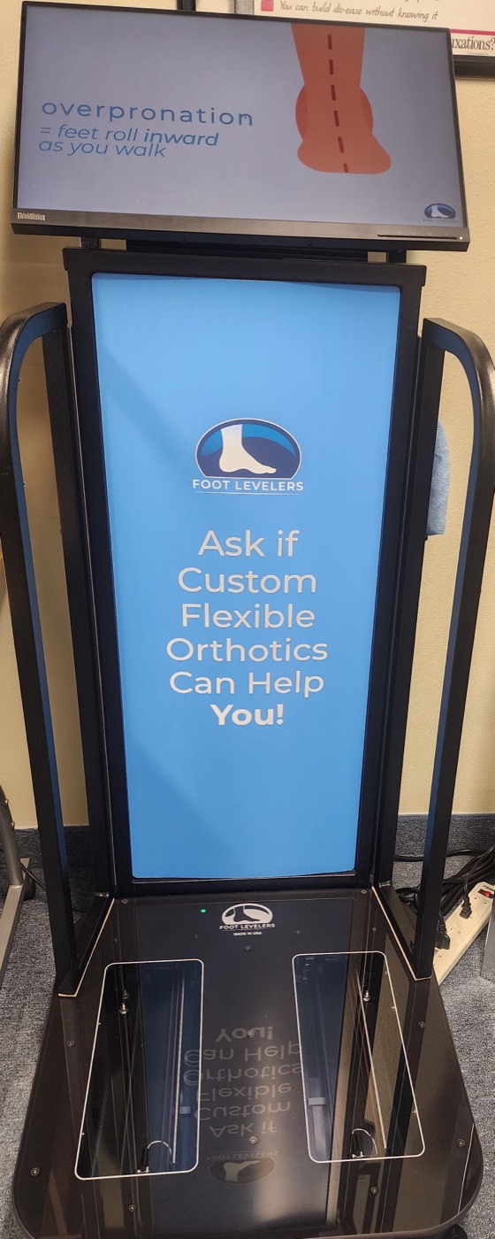 The Foot Levelers digital foot scanning kiosk at Chiropractic Works Wellness Center