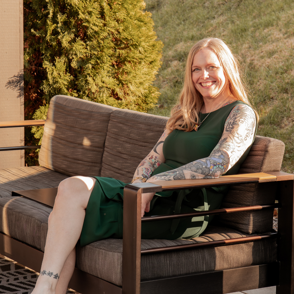 Julia Richardson seated outdoors