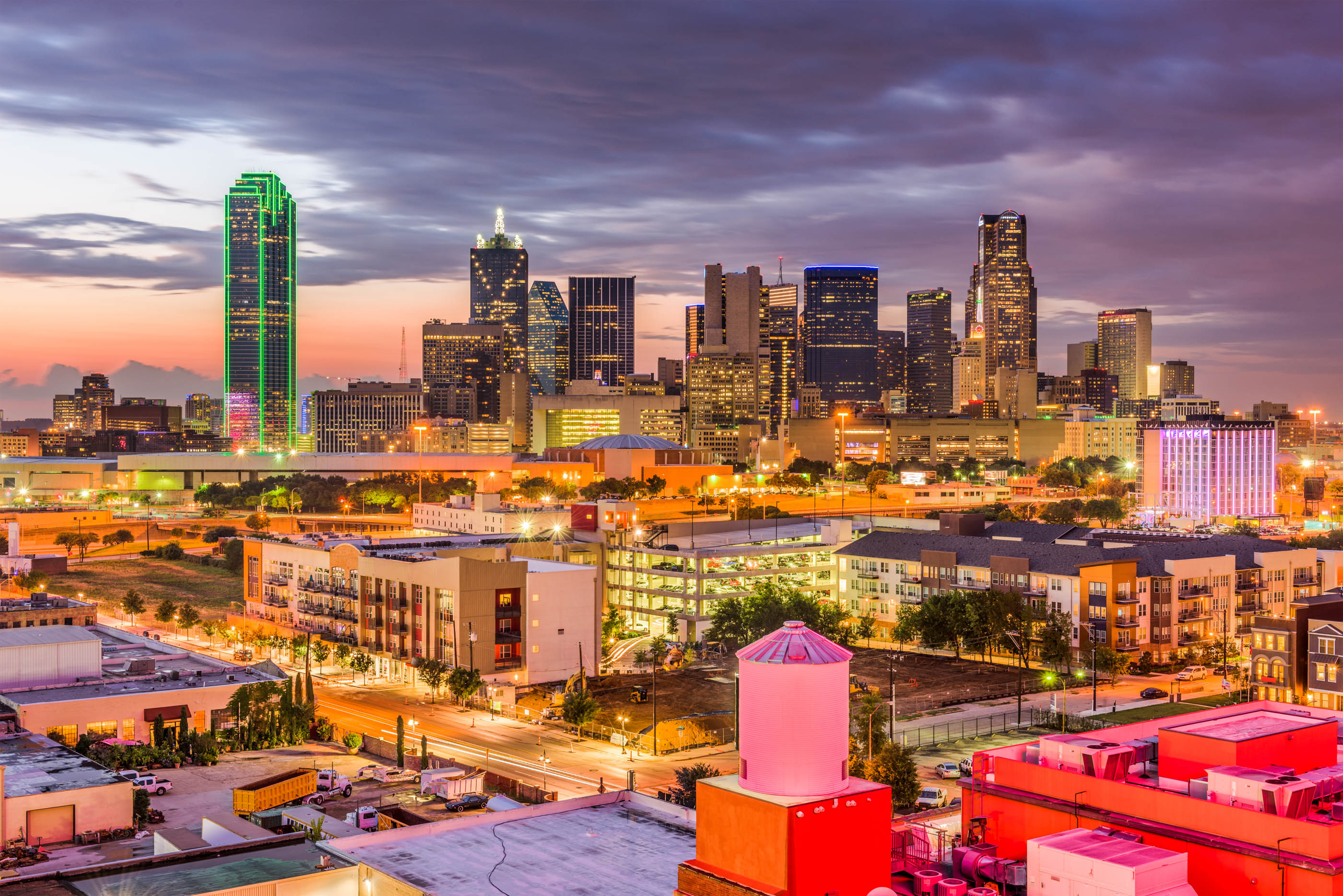 Dallas skyline under a pink sunset