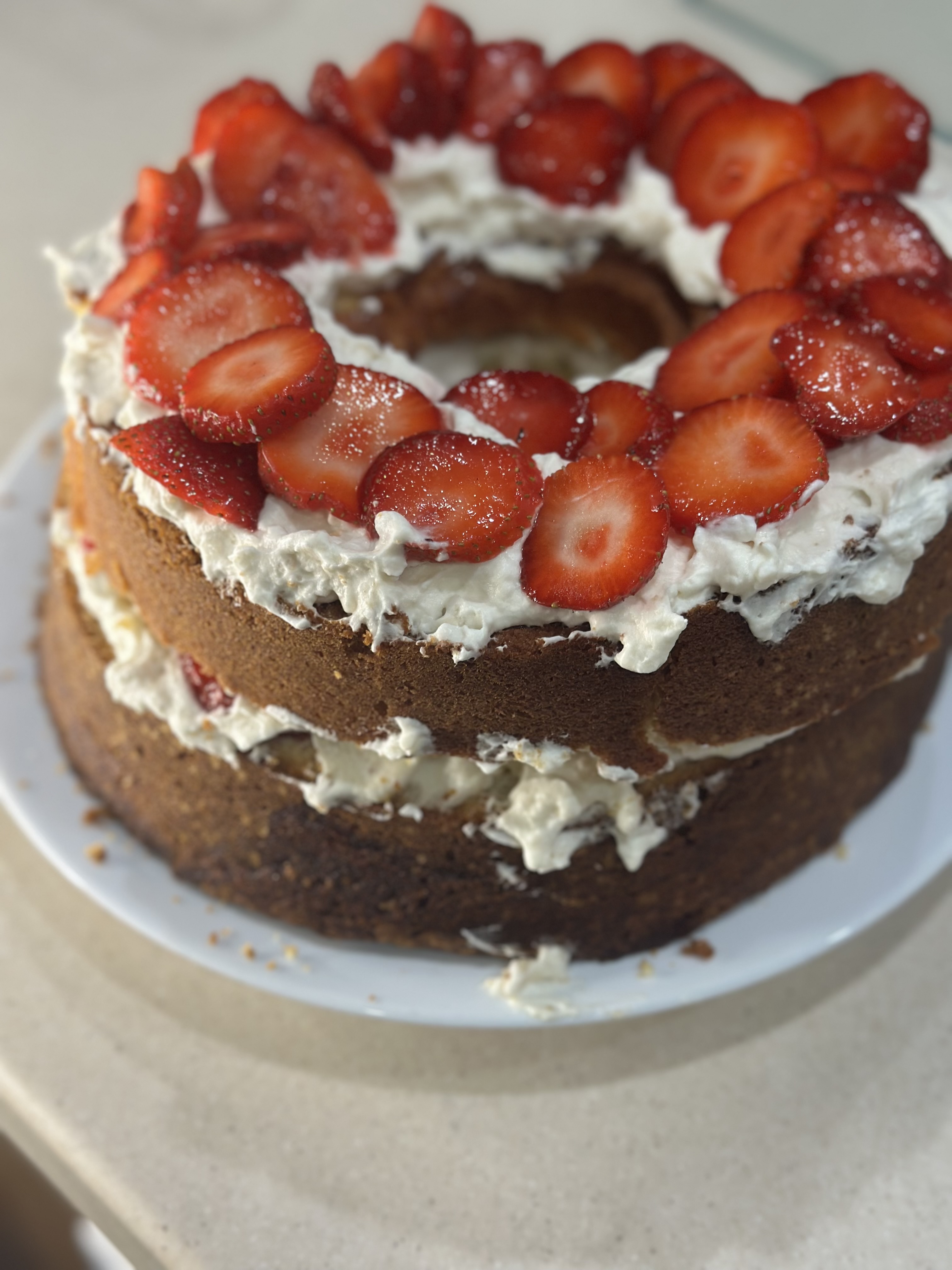 making strawberry shortcake in the kitchen after picking berries