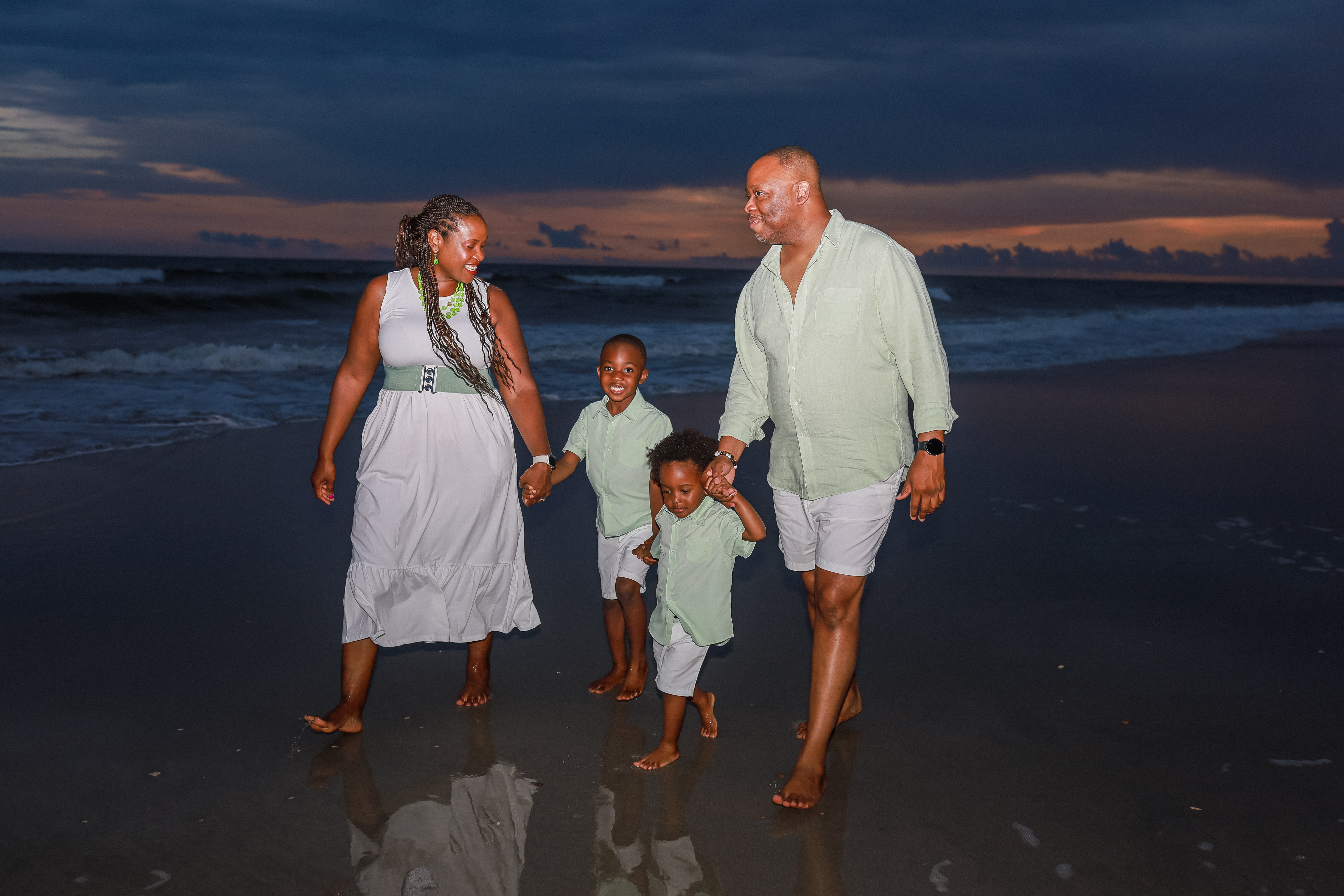 family taking sunset family photo in myrtle beach south carolina family taking sunset family photo in myrtle beach south carolina