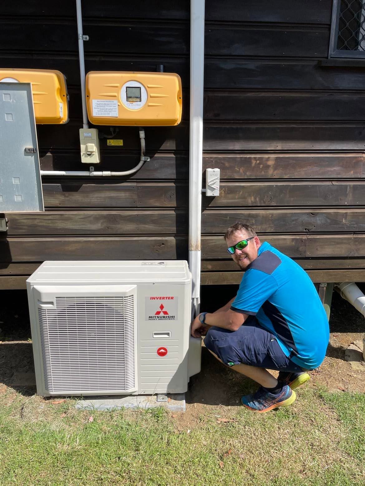 Heath Plain Electrical electrician installing air con system at a Narangba home