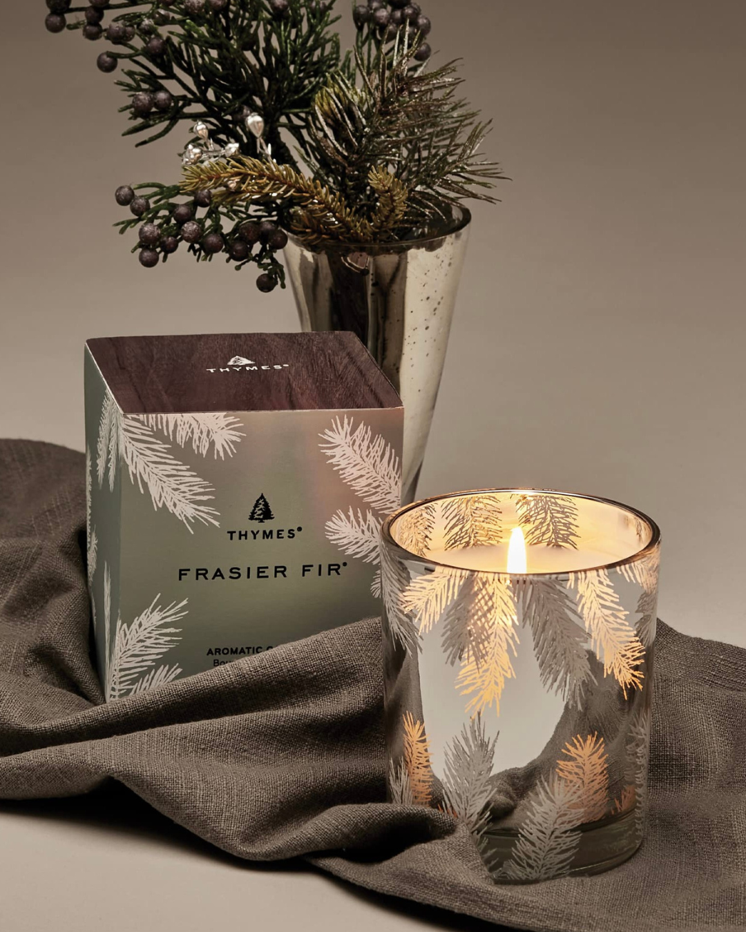 Thymes Frasier Fir candle and gift box with evergreen arrangement