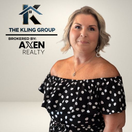 Deborah Kling showcasing innovative real estate solutions at Your Home Sold Guaranteed Realty - Kling Group office.