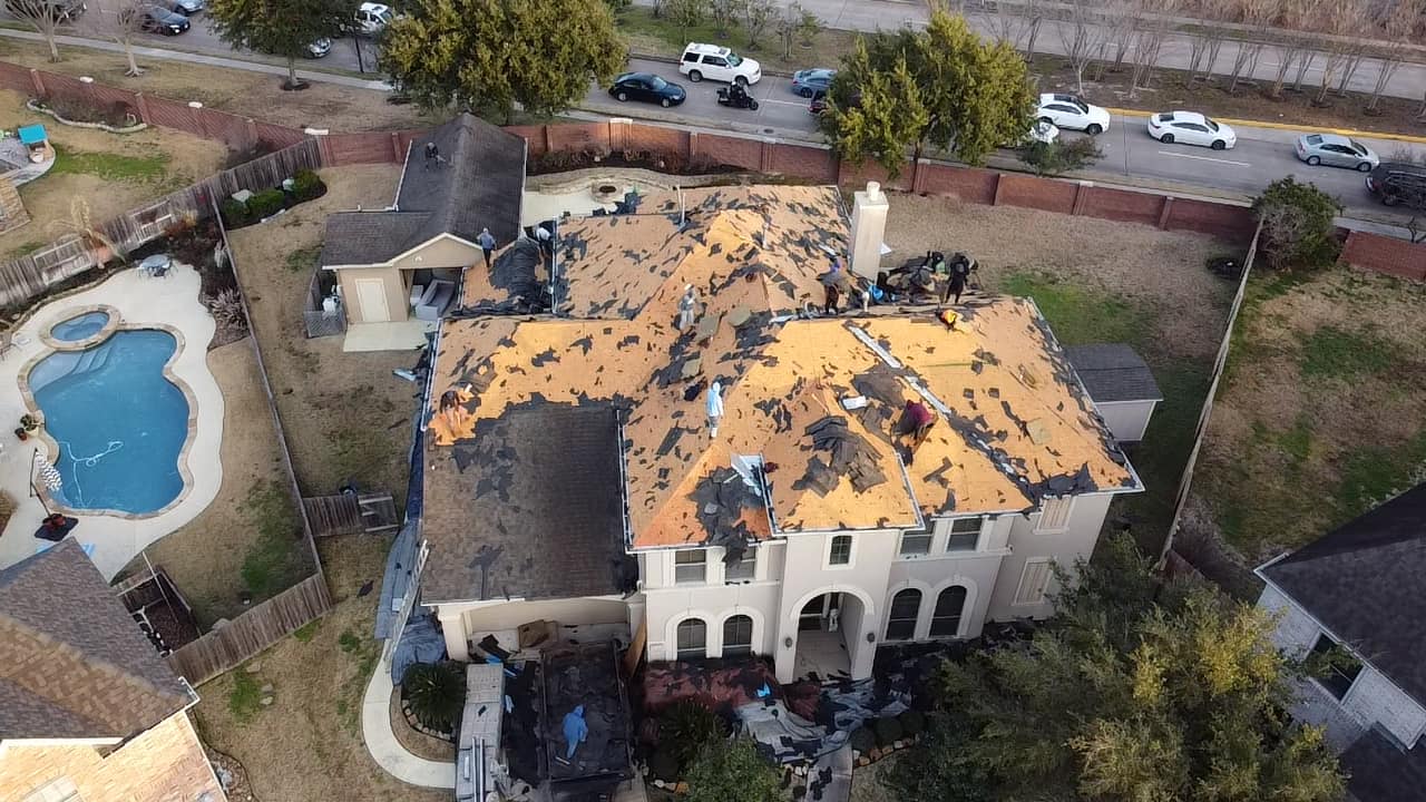 Crowns of Texas crew working on a roof