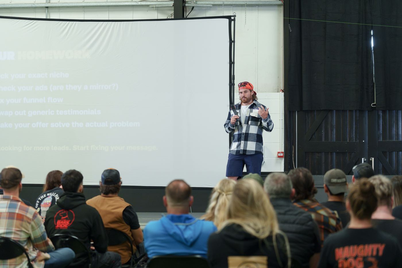 Talk on stage at the mentorship weekend