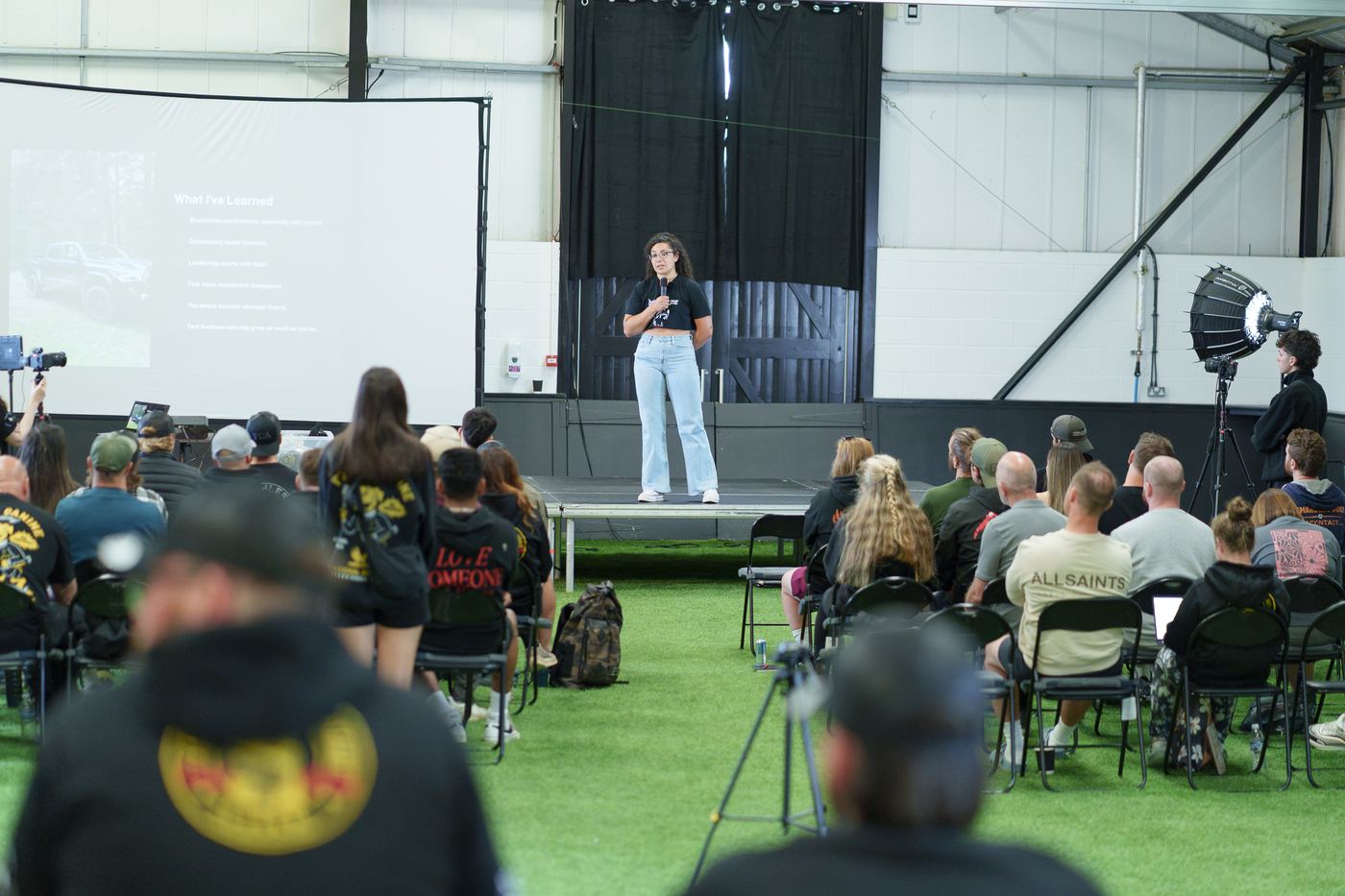 Speaker on stage at the Vantage Pro mentorship weekend, Leeds
