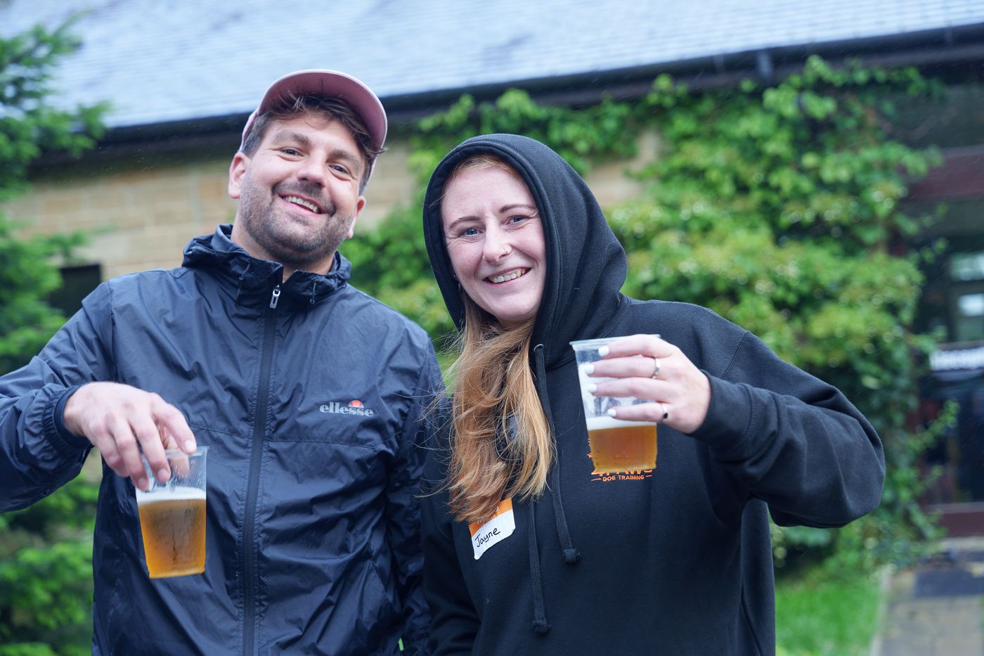 Two members with a drink after the sessions
