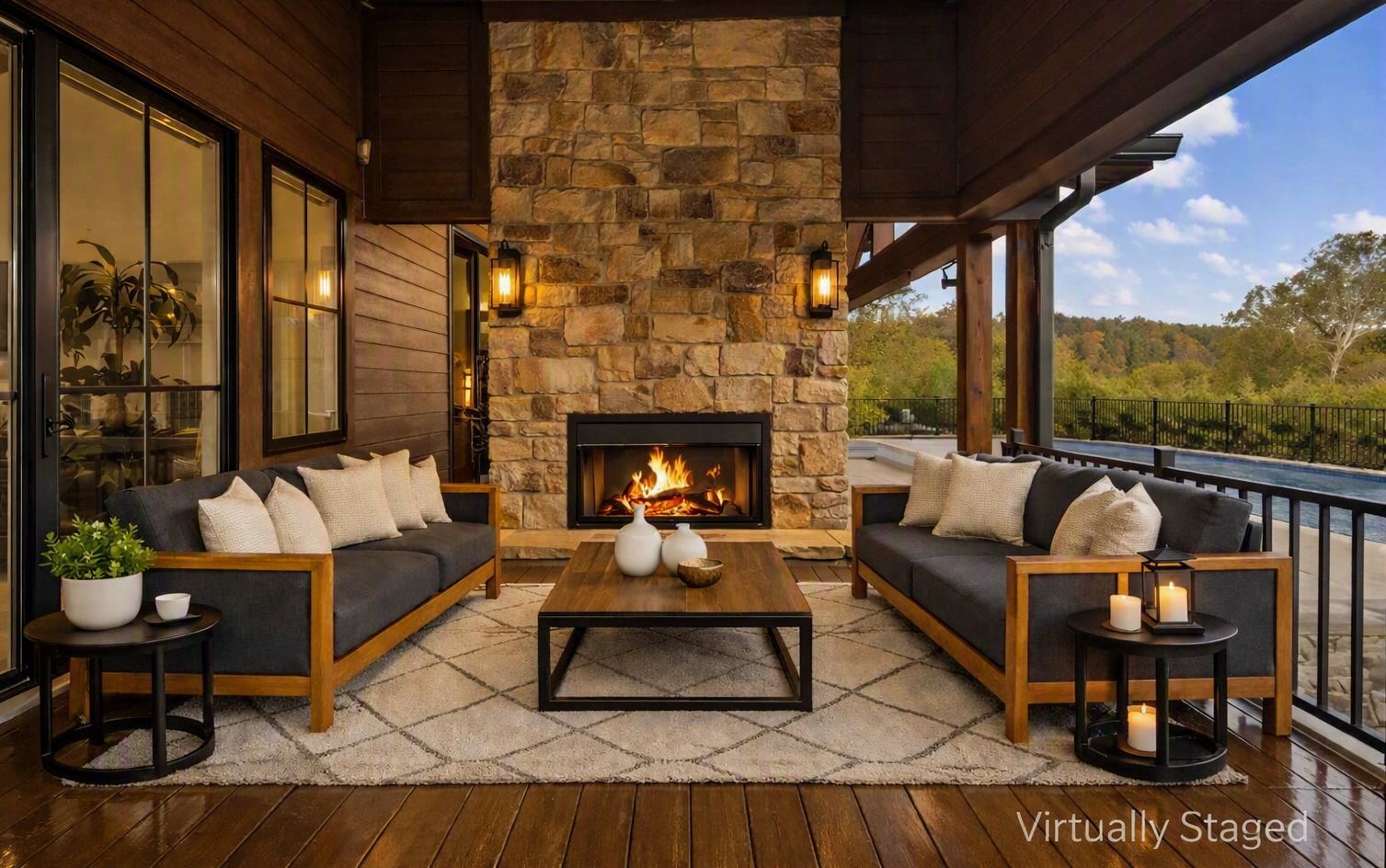 Covered outdoor living space with stone fireplace