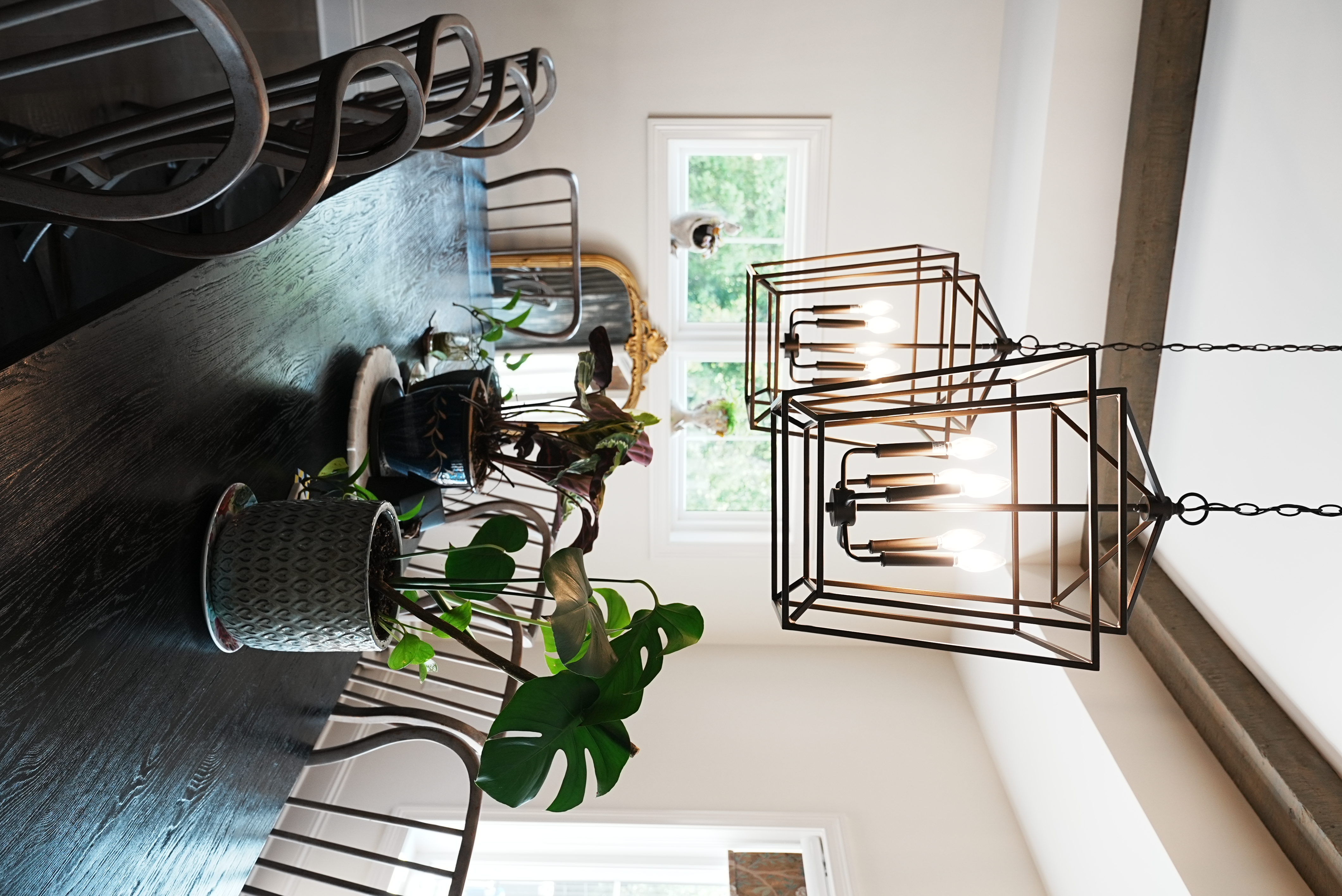 Dining room with dual lantern pendant lights