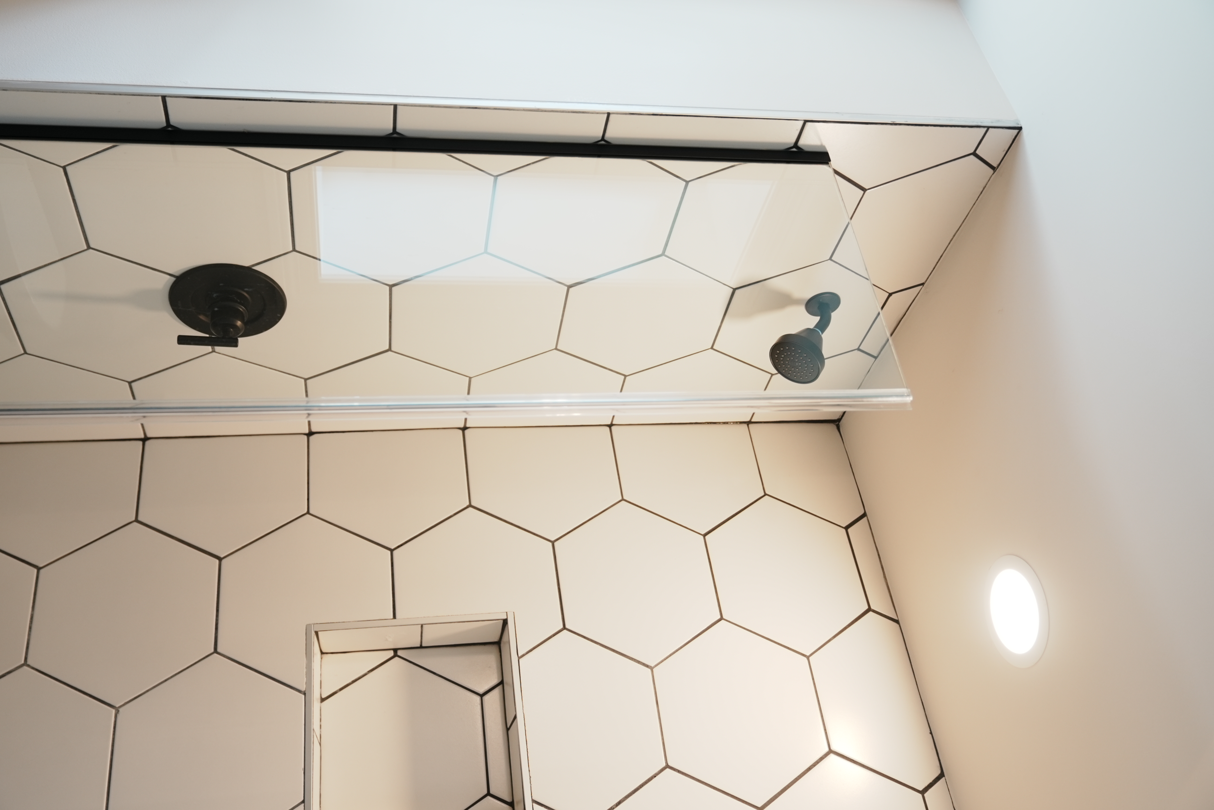 Bathroom shower with hexagon tile