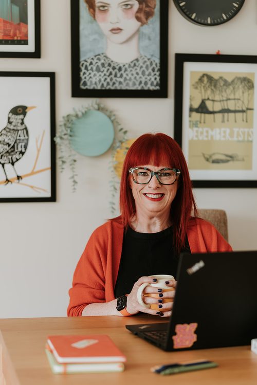 Vicki at her desk