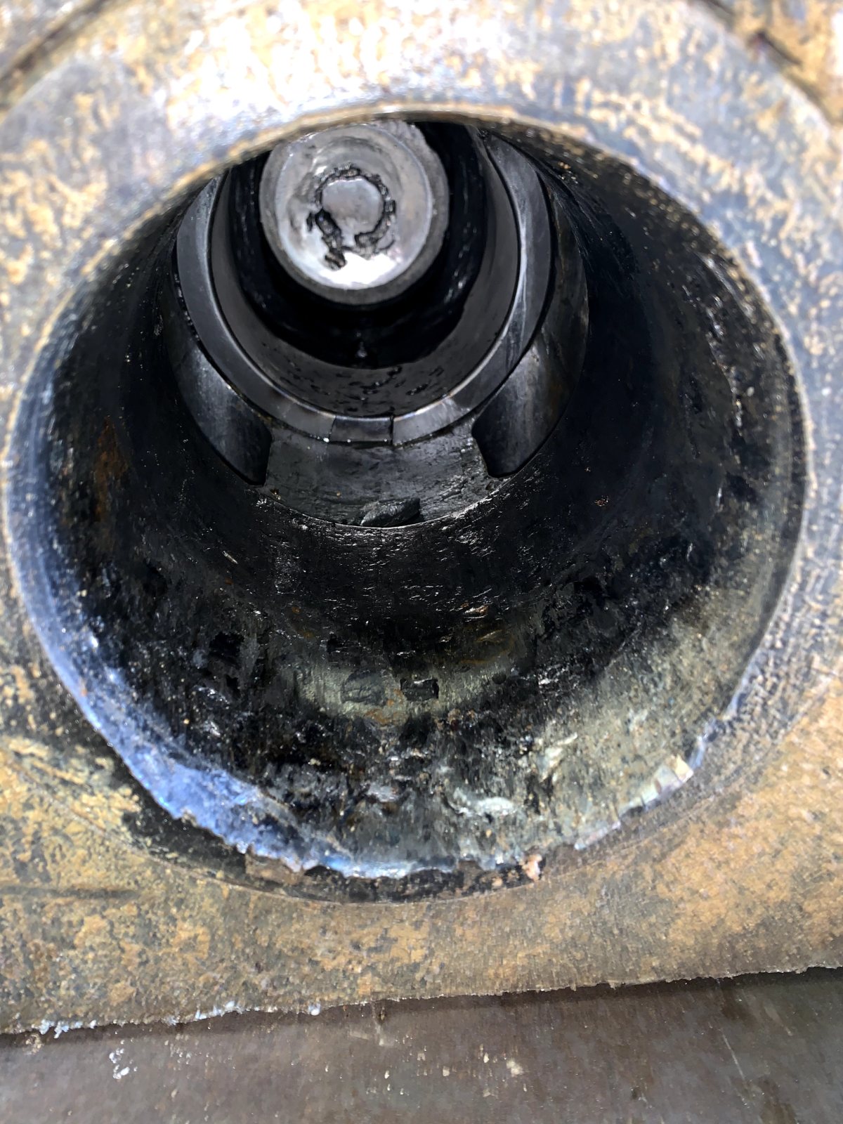Inside view of a hydraulic hammer housing during inspection