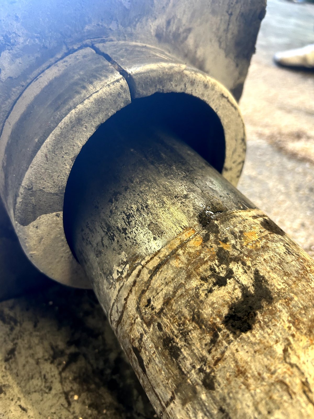 Close-up of a worn hammer tool and bushing